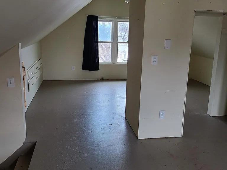 Large finished attic with built in drawers