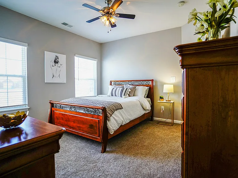 Rest easy in a spacious, light-filled primary bedroom at The Bristol Apartments in Camby, IN _ designed for comfort, style, and everyday living.