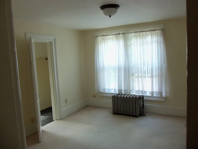 living room with small closet to the left