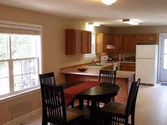 Dining Room and Kitchen
						:
						Part of an open floor plan, the dining room & kitchen are great for entertaining