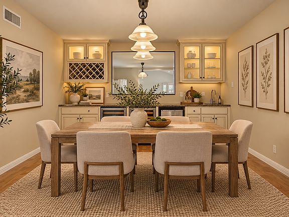 Staged formal dining room.