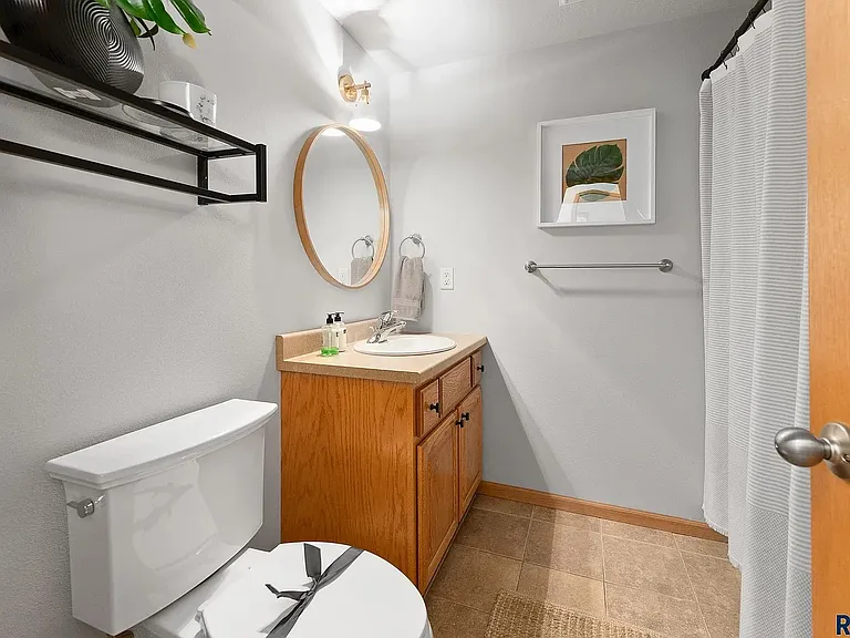 6107 S Avalon Ave — Photo 8