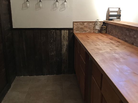 Behind basement bar. 