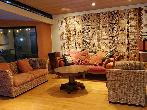 Entering through the front door is the lower living room.