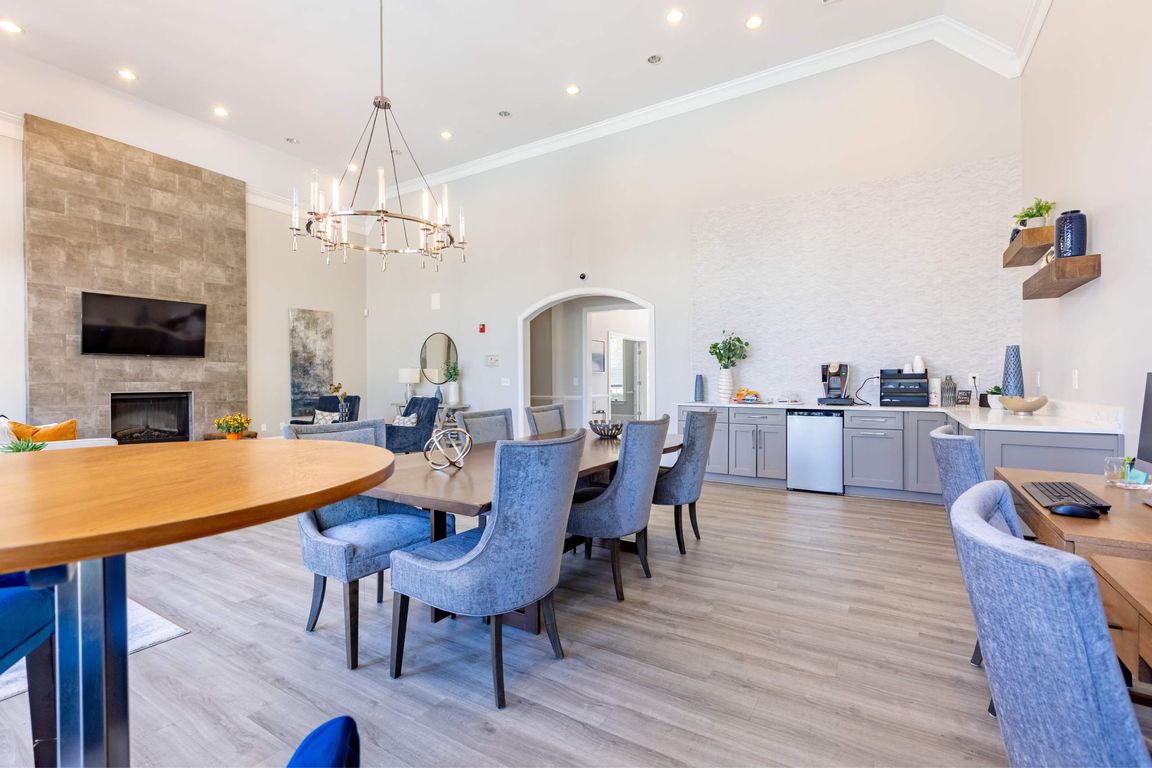 Open concept and brightly lit clubhouse at Heron Lake