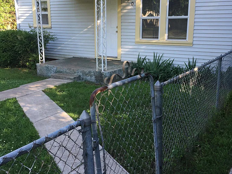 Walkway to driveway and carport