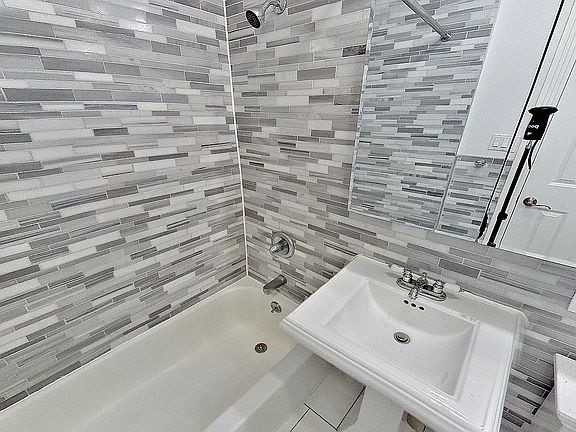 5th image of 410 E 13th St APT 1D