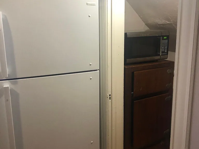 Entry into large closet/pantry area.