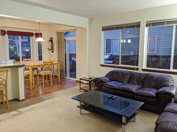 Main floor family room next to open kitchen.