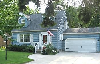 Large 4 bedroom, 2 bath home located in Essexville. Hardwood floors on most of main floor & all bedrooms. Mostly newer windows. Gas burning fireplace in living room. Screened porch off back overlooks deep fenced yard & above ground pool. Full basement has rec room. 2 car attached garage with opener. Shed in back, also 