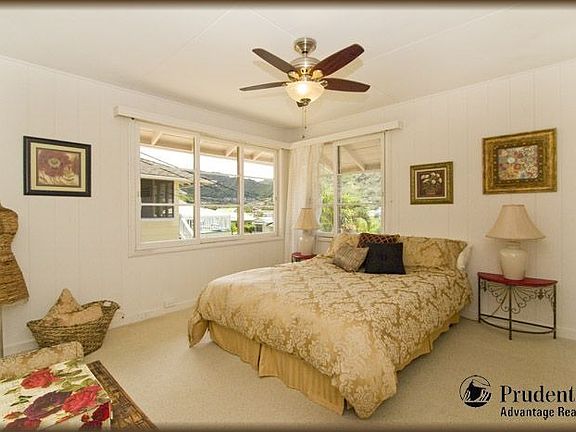 Master bedroom has views of the lush valley