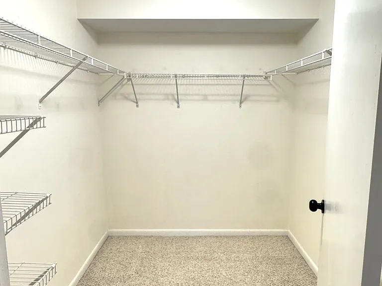 Walk-in closet attached to master bedroom