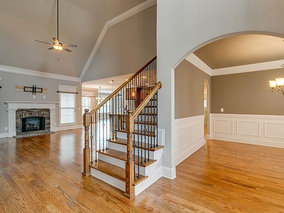 Large vaulted living makes for an impressive, yet warm and inviting entertaining space.