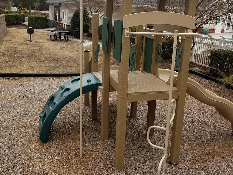 Kid's play ground. Barbecue grill & benches