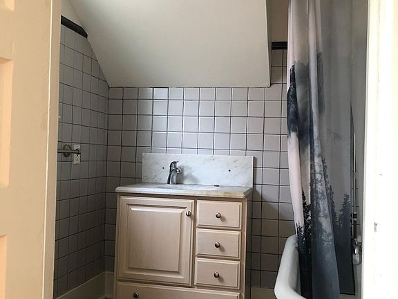 Full bath with clawfoot tub