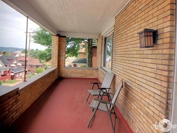 Enjoy your summer evenings on your covered front porch.