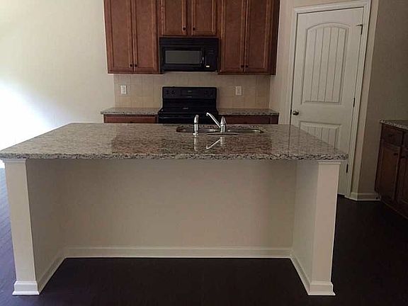 Huge island open to family room