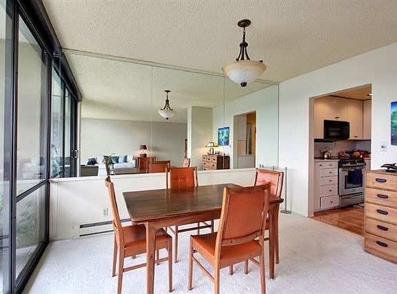 Dining Room with Sliders to Deck and view to Kitchen