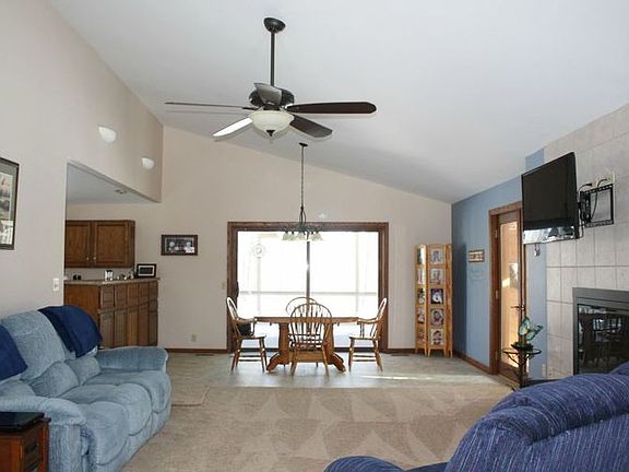 The great room layout is casual, bright, and spacious!