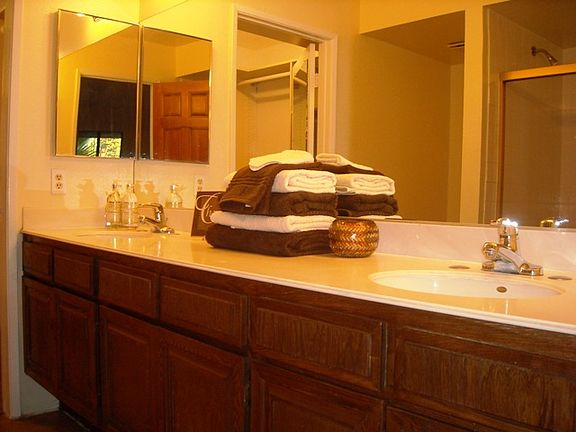 dual sink vanity w/ lots of storage in master bath