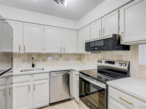 2nd image of 11975 E Harvard Avenue #205