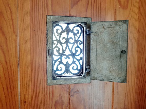 Front door feature to peek at visitors