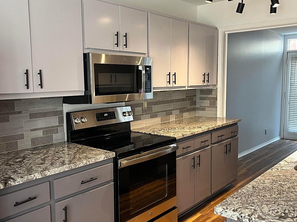Stainless appliances throughout. Granite countertops. LED track lighting.