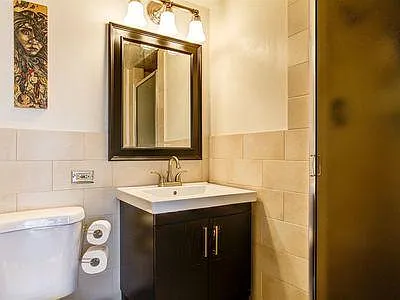 Master bathroom - attached to bedroom and renovated.