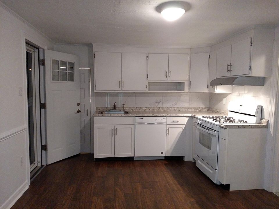 Large eat-in kitchen with walk-in pantry and laundry room.