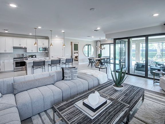 Open flow-through layout offering connected living spaces with ample natural light