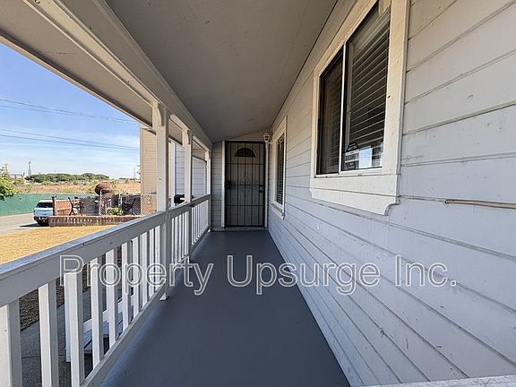 2nd image of 104 E 6th St