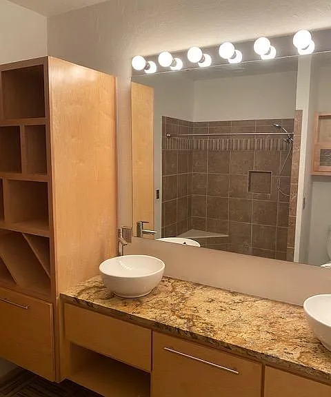 Bathroom. Granite countertops, Tiled shower