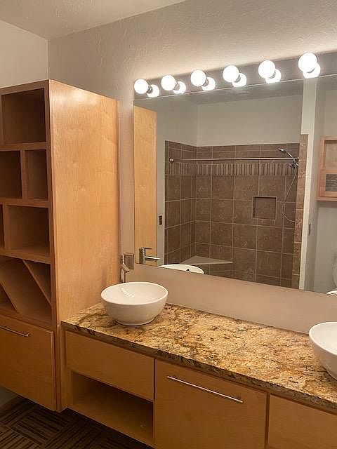 Bathroom. Granite countertops, Tiled shower