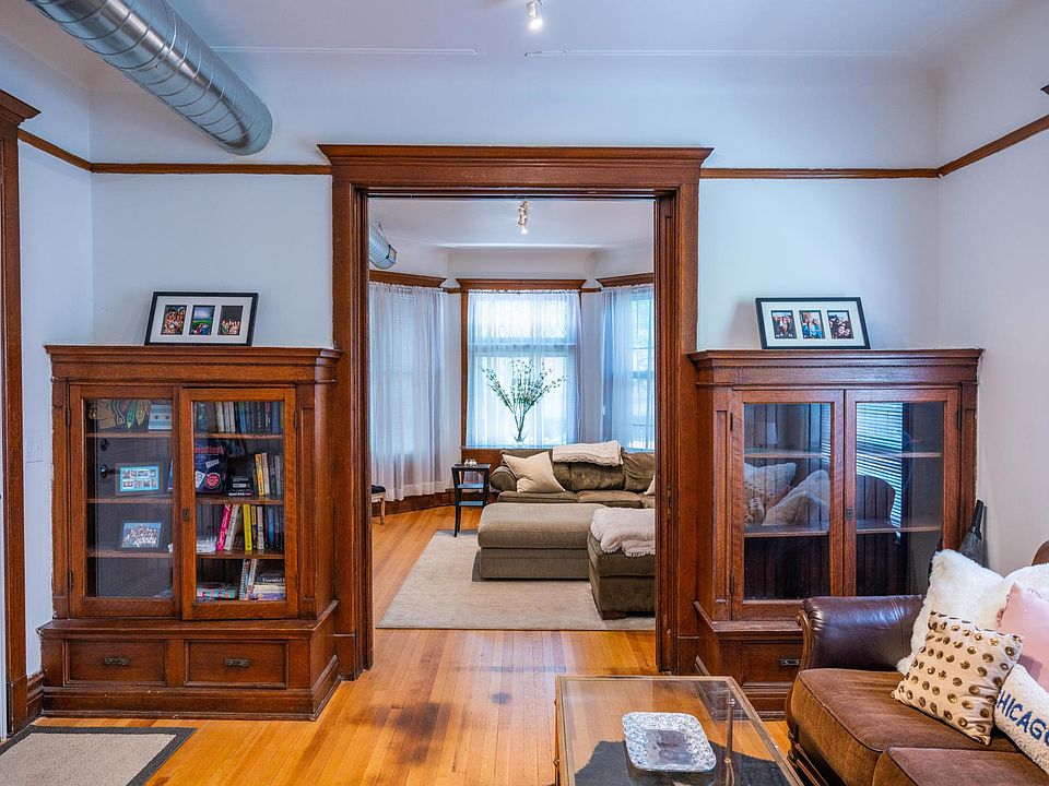 Built-in bookshelves in the parlor and pocket doors separating each room!