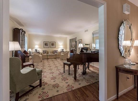 Living Room off front entry.  Leads to separate formal dining room