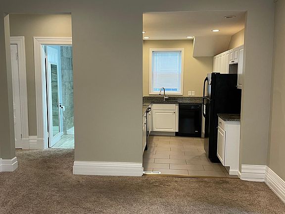 Dining room looking towards kitchen and back hallway