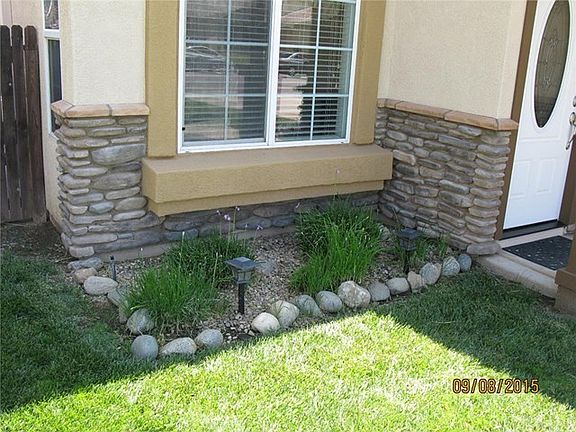 Front Exterior View 3- window trim, stone accents