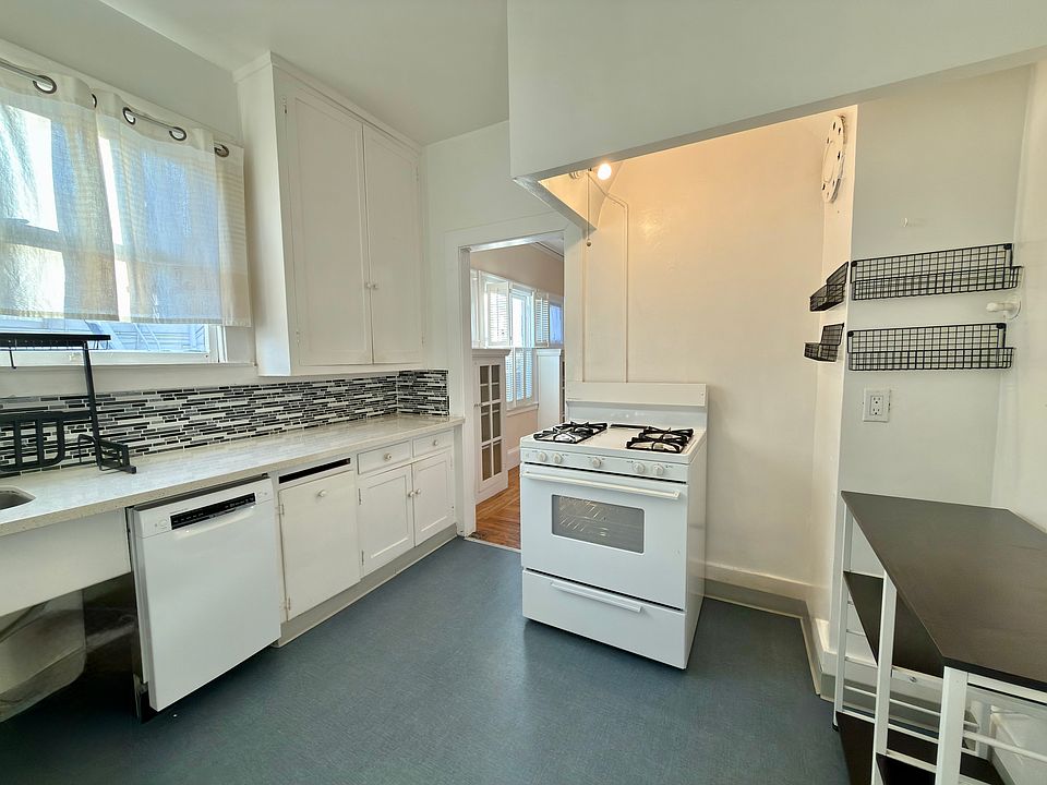Kitchen with dishwasher and gas range