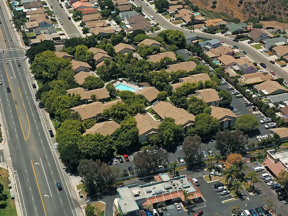 Aerial view of Foxwood Apartments' exclusive forested greenbelt area!