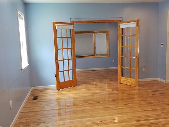 view of the living room and the sun room