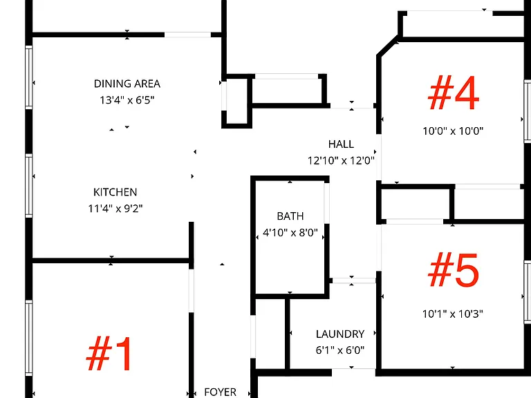Labeled floor plan showing room layout with kitchen, dining area, multiple baths, laundry, and garage access.