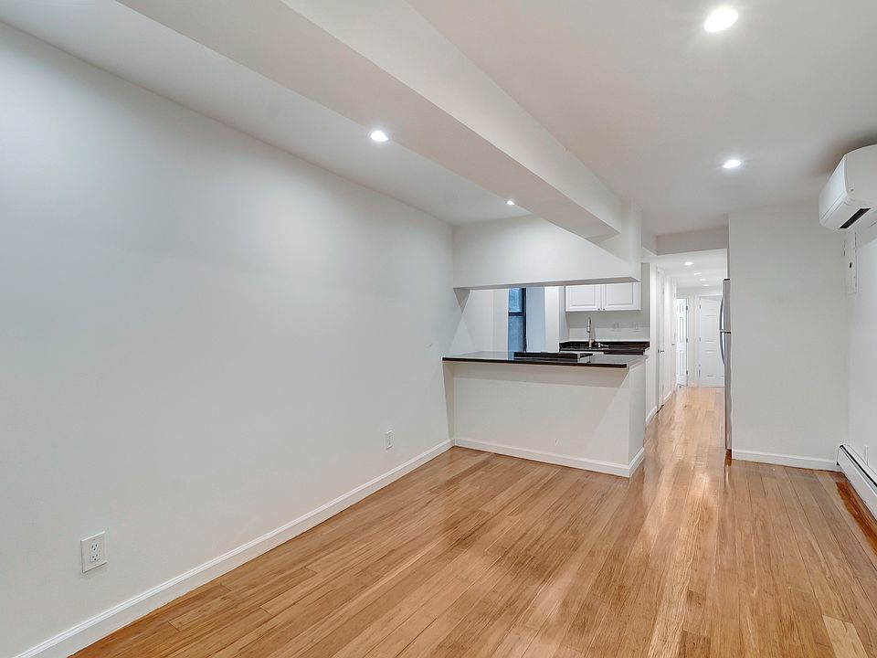 1st image of 31 E 1st St