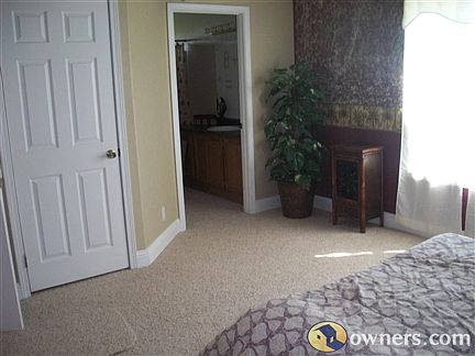 View of master bath w/new counters & walk-in closet