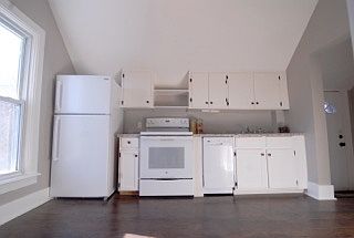 New appliances include dishwasher, range, and refrigerator.