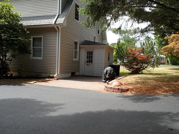 Rear entrance next to off street parking lot