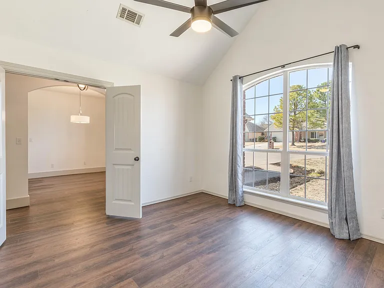 Home Office or Fourth Bedroom with View to Dining Room
