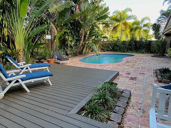 backyard with pool and deck