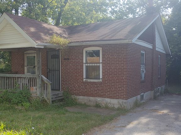 Front of house (gutters and vegetation have since been cleaned up - see next photo)