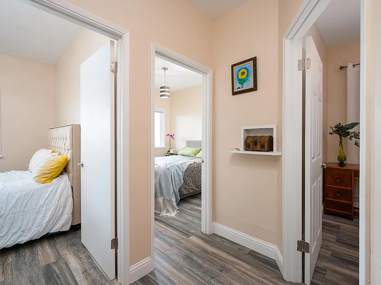 Entrance to three bedrooms.