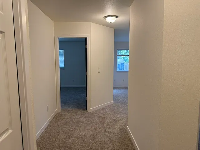 Hallway looking at main bedroom doorway